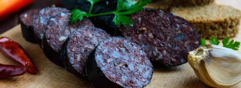 Black pudding hash cakes with buttery cabbage