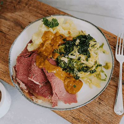 Corned Beef with Mustard Sauce, Creamy Mashed Potato and Buttery Cabbage.